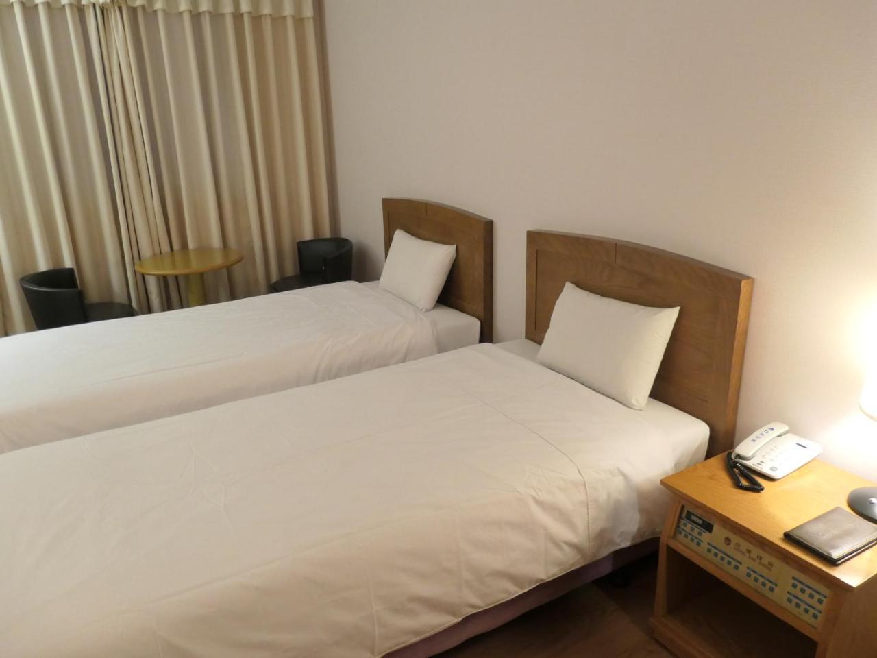 Daedong Hotel Чеджу Стая снимка